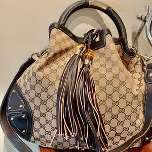 Exclusive Gucci top handle plus shoulder strap Large bag.